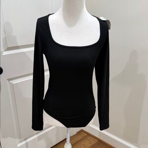 Black long sleeve body suit. Hollister